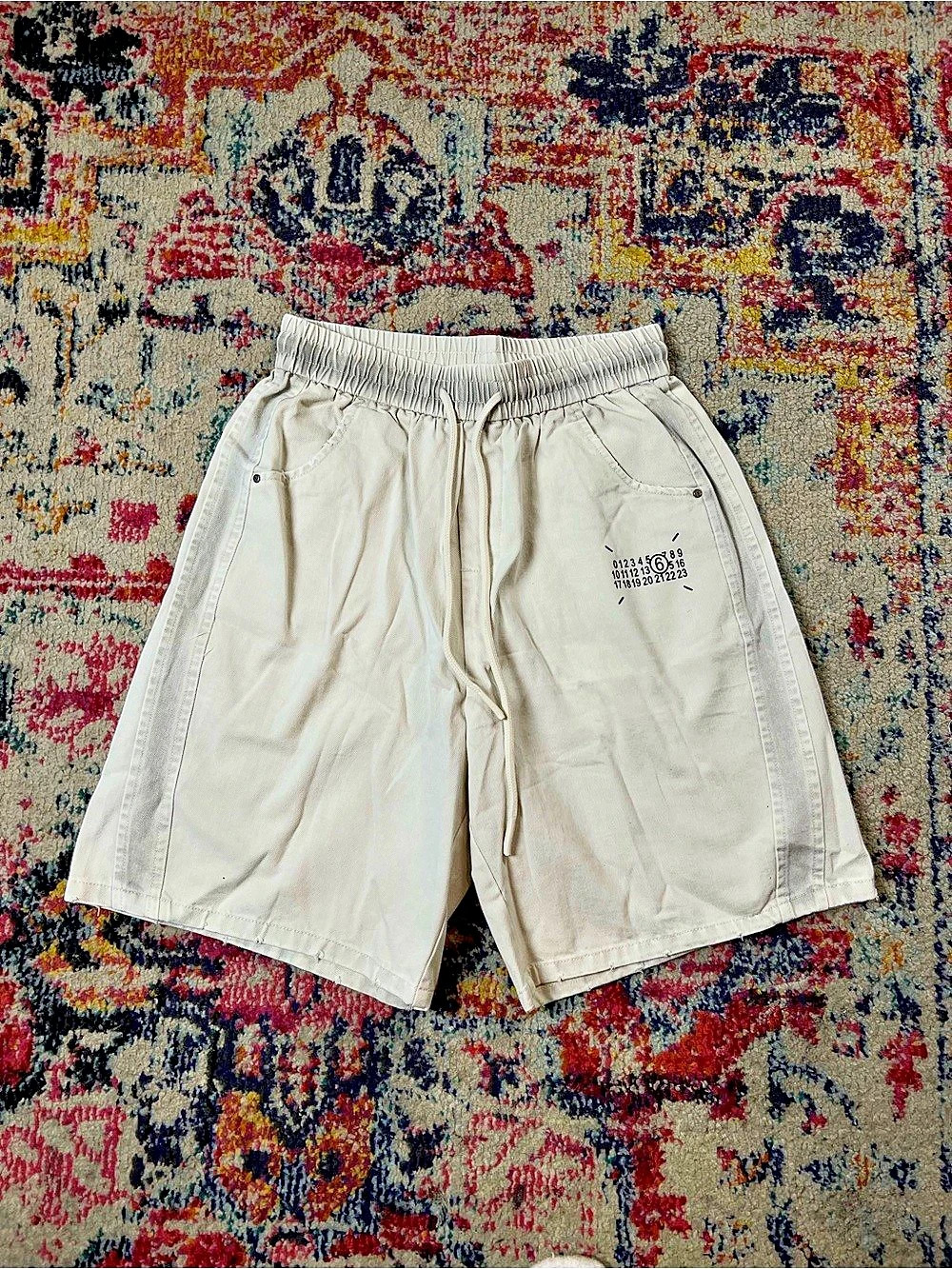 Cream drawstring shorts